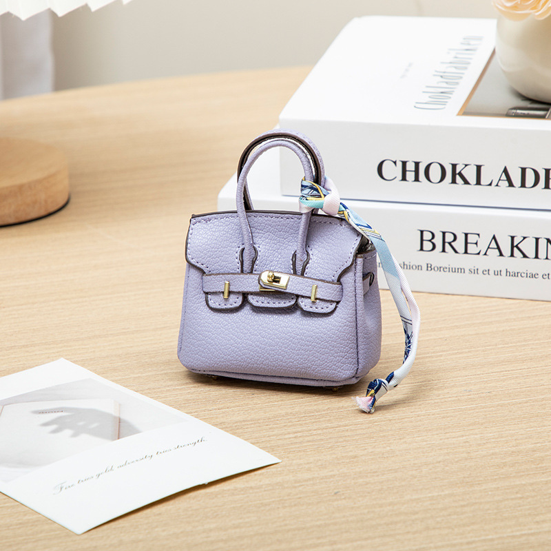 H brand's new mini charm for lipstick bags, earphone bags, car key bags, platinum bags, creative and cute bag ornaments.