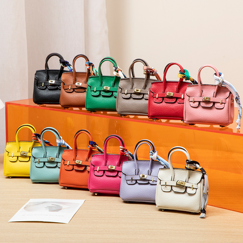 H brand's new mini charm for lipstick bags, earphone bags, car key bags, platinum bags, creative and cute bag ornaments.