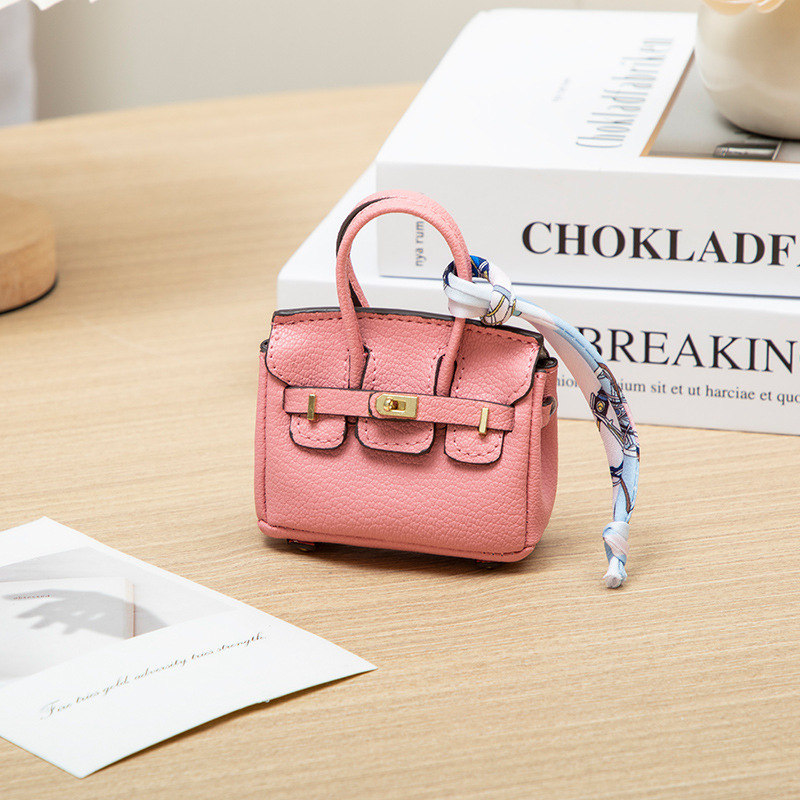 H brand's new mini charm for lipstick bags, earphone bags, car key bags, platinum bags, creative and cute bag ornaments.