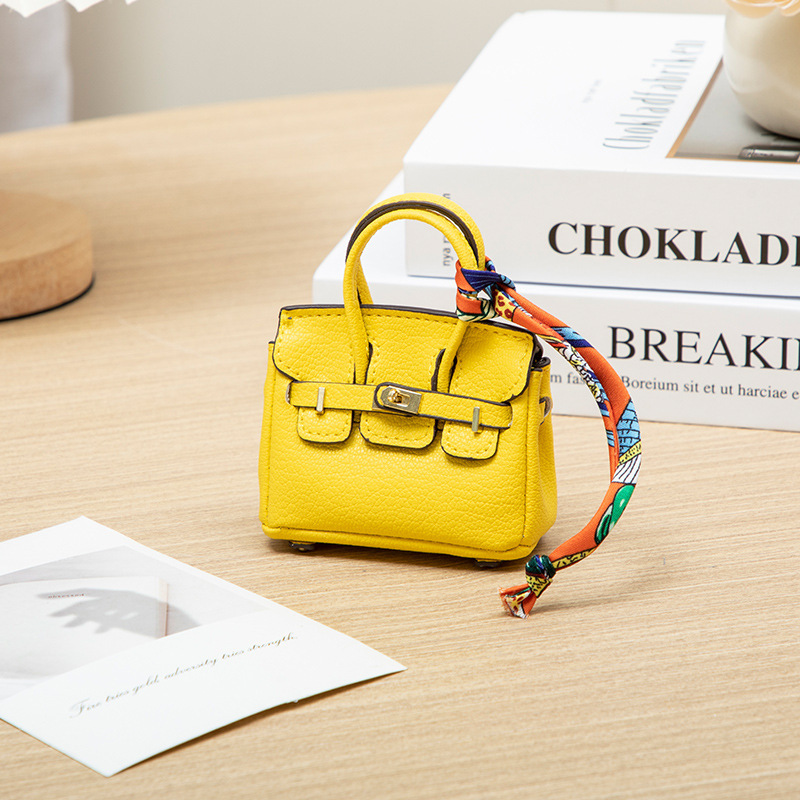 H brand's new mini charm for lipstick bags, earphone bags, car key bags, platinum bags, creative and cute bag ornaments.