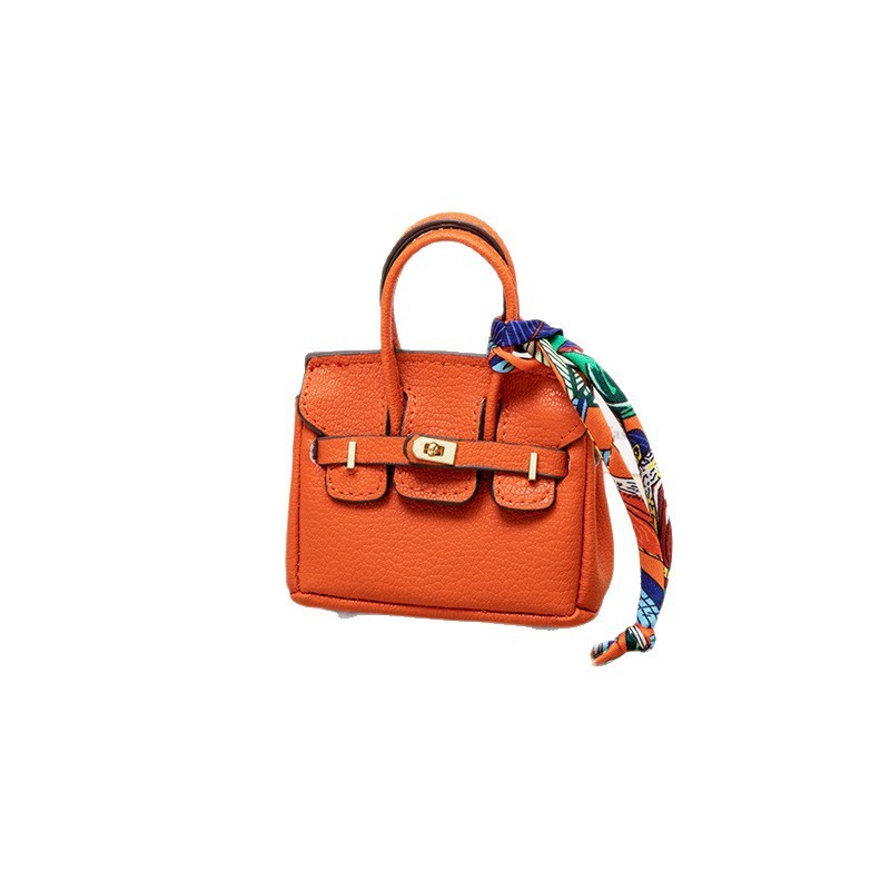 H brand's new mini charm for lipstick bags, earphone bags, car key bags, platinum bags, creative and cute bag ornaments.