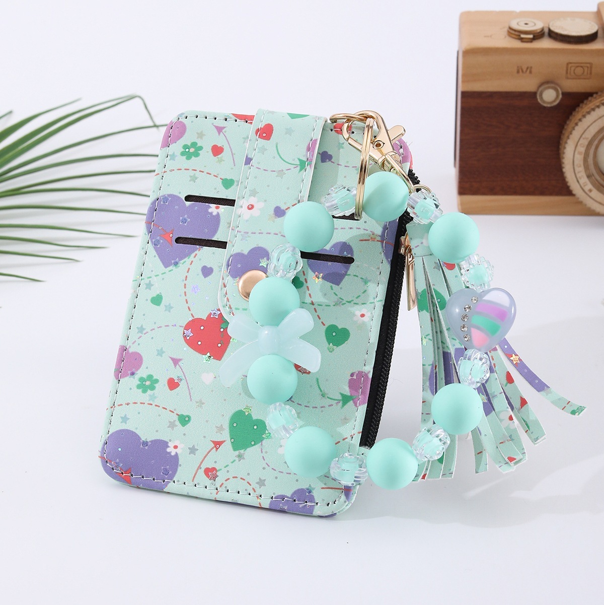 Amazon's best-selling spring-themed silicone bracelet with floral, heart, and bow designs, beaded card holder, coin purse, and charm.