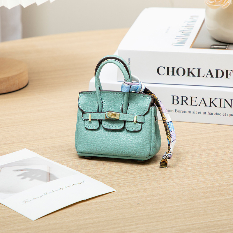 H brand's new mini charm for lipstick bags, earphone bags, car key bags, platinum bags, creative and cute bag ornaments.