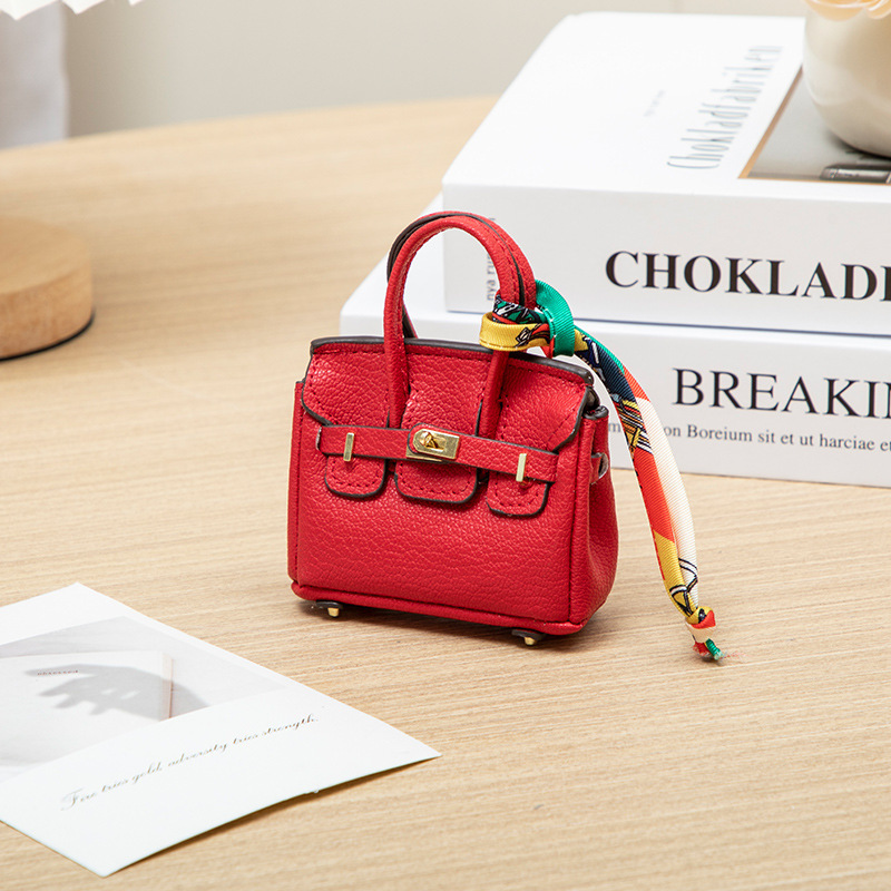 H brand's new mini charm for lipstick bags, earphone bags, car key bags, platinum bags, creative and cute bag ornaments.