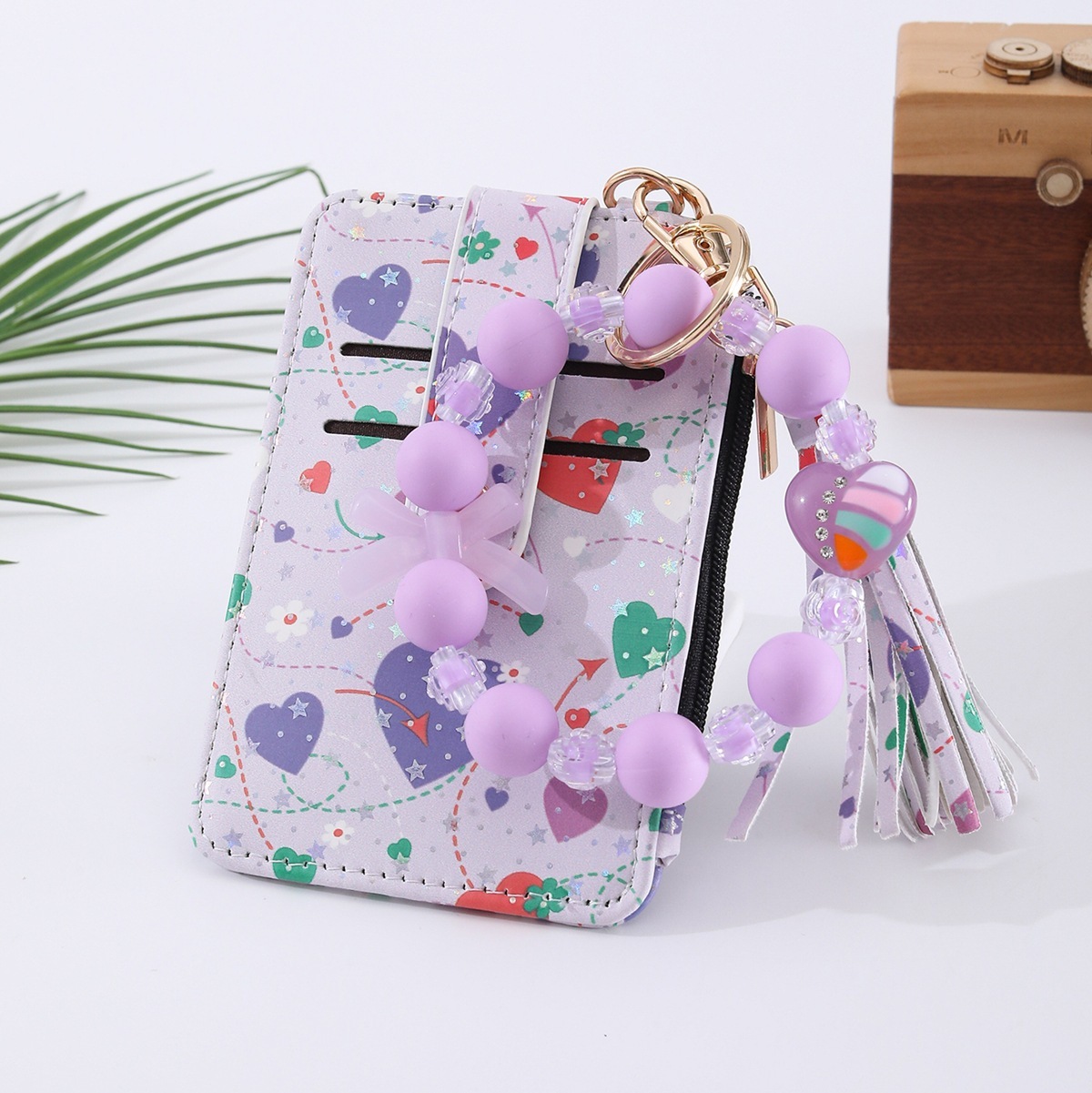 Amazon's best-selling spring-themed silicone bracelet with floral, heart, and bow designs, beaded card holder, coin purse, and charm.