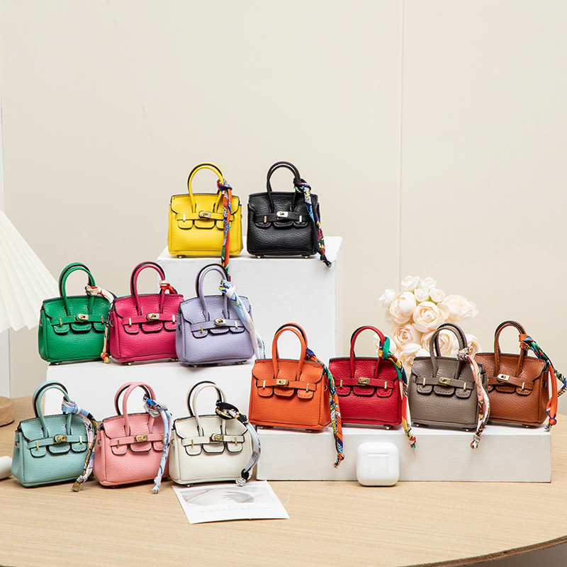H brand's new mini charm for lipstick bags, earphone bags, car key bags, platinum bags, creative and cute bag ornaments.