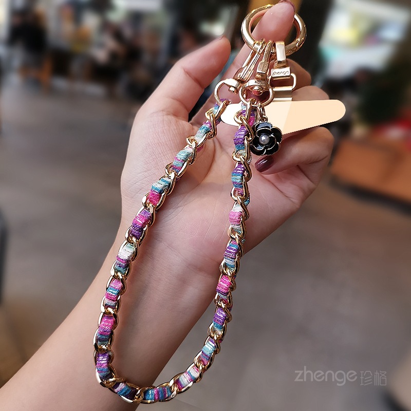 Mobile phone lanyard, Chanel-style camellia pendant, mobile phone chain, wrist charm, short and fashionable metal chain.
