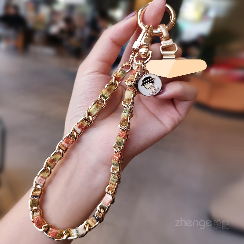 Mobile phone lanyard, Chanel-style camellia pendant, mobile phone chain, wrist charm, short and fashionable metal chain.
