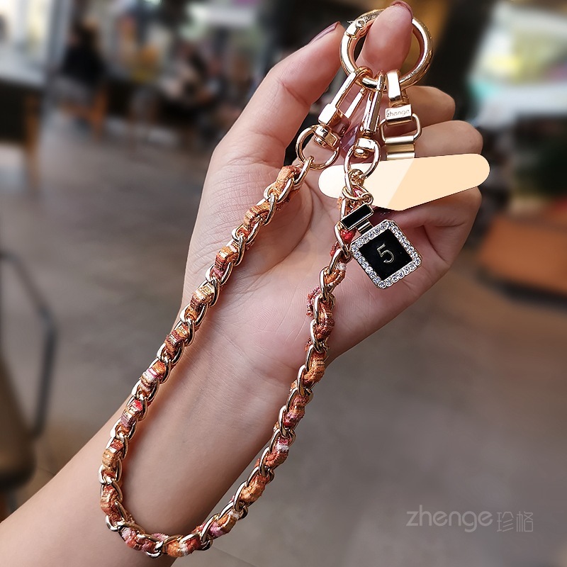 Mobile phone lanyard, Chanel-style camellia pendant, mobile phone chain, wrist charm, short and fashionable metal chain.