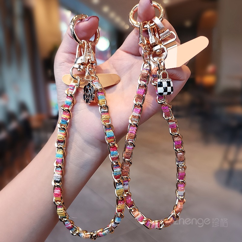 Mobile phone lanyard, Chanel-style camellia pendant, mobile phone chain, wrist charm, short and fashionable metal chain.