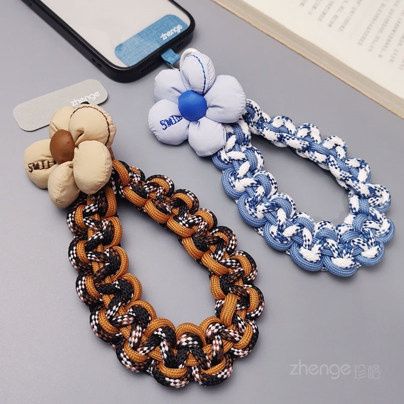 Flower-woven wristband for mobile phones, short and stylish, perfect for outdoor use, anti-loss, travel, and hiking.