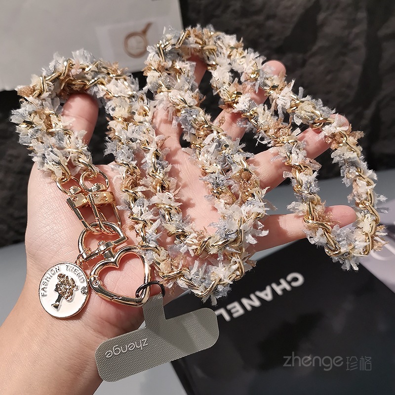 Chanel-inspired metal chain phone strap, long crossbody style, trendy and unique for women, suitable for outdoor use and travel.