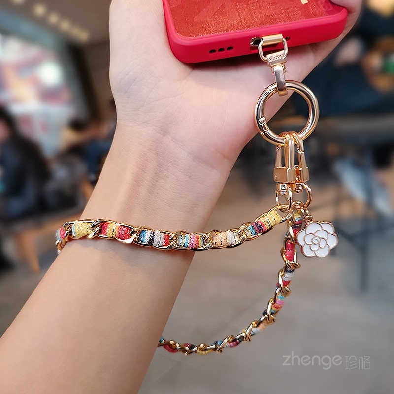Mobile phone lanyard, Chanel-style camellia pendant, mobile phone chain, wrist charm, short and fashionable metal chain.