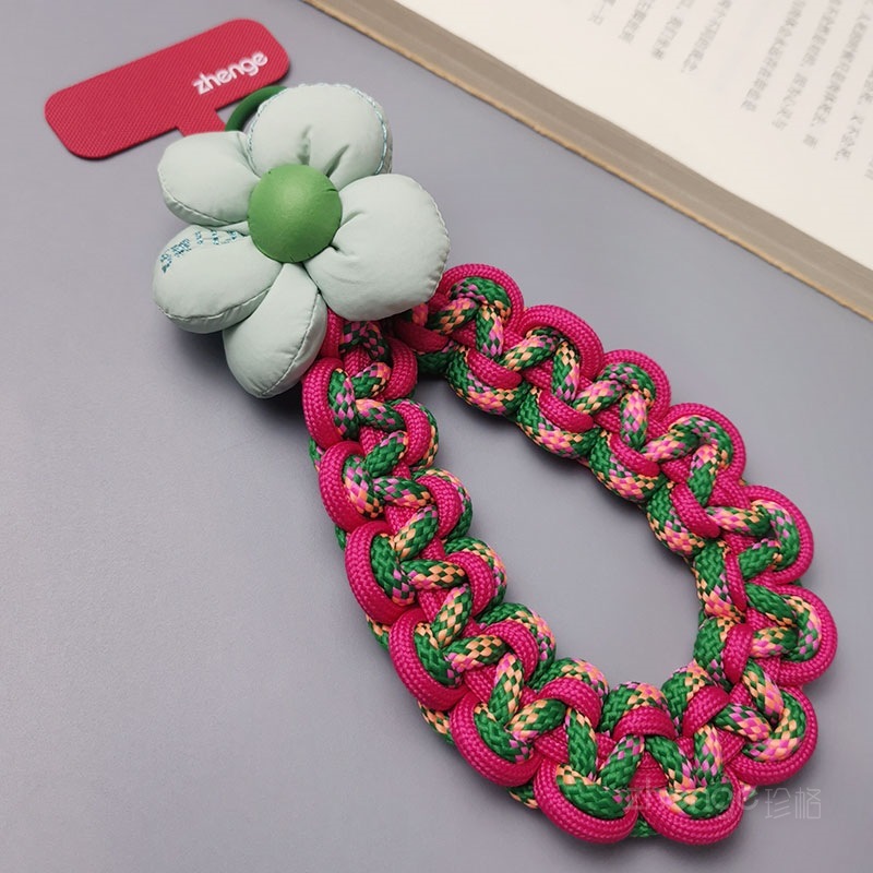 Flower-woven wristband for mobile phones, short and stylish, perfect for outdoor use, anti-loss, travel, and hiking.
