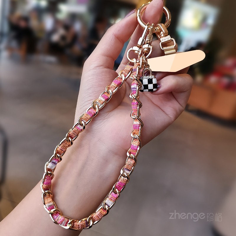 Mobile phone lanyard, Chanel-style camellia pendant, mobile phone chain, wrist charm, short and fashionable metal chain.