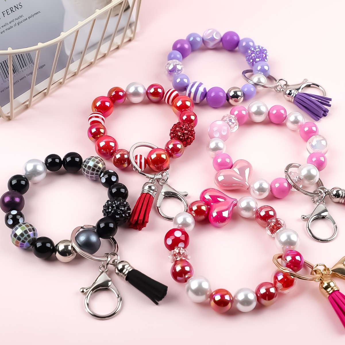 Amazon's new acrylic bracelet with handmade tassels, heart-shaped light ball, beaded charm, keychain, and bracelet.