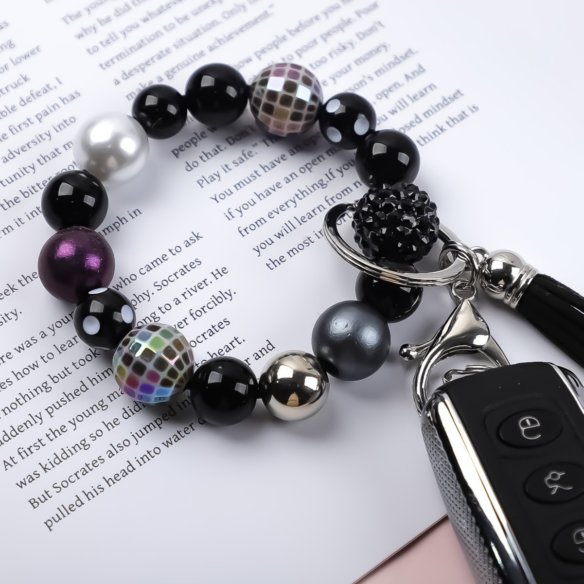 Amazon's new acrylic bracelet with handmade tassels, heart-shaped light ball, beaded charm, keychain, and bracelet.