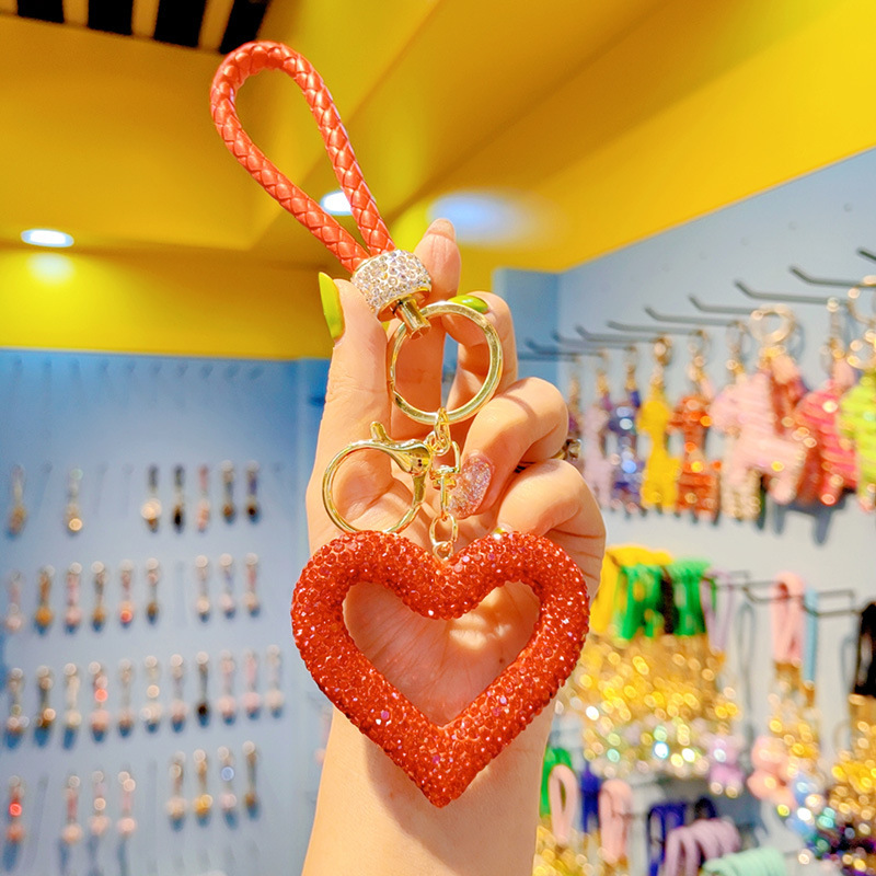 Korean style full rhinestone hollow heart keychain, cute women's peach heart tassel bag keychain ring ornament wholesale