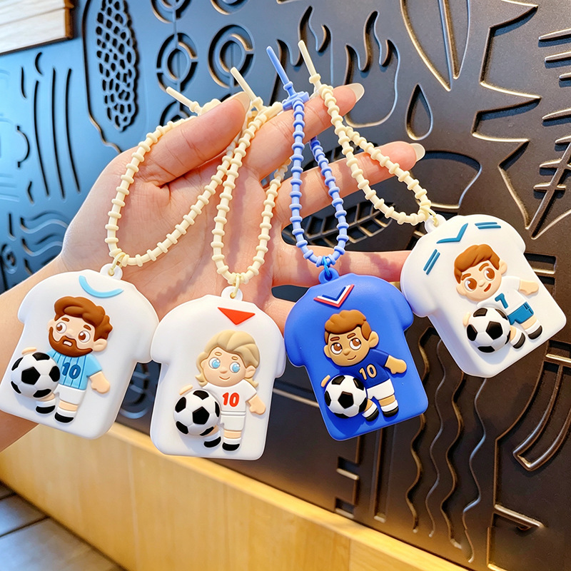 Cute and stylish silicone sculptable World Cup jersey keychain for women, perfect for backpacks, phones, and clothing.