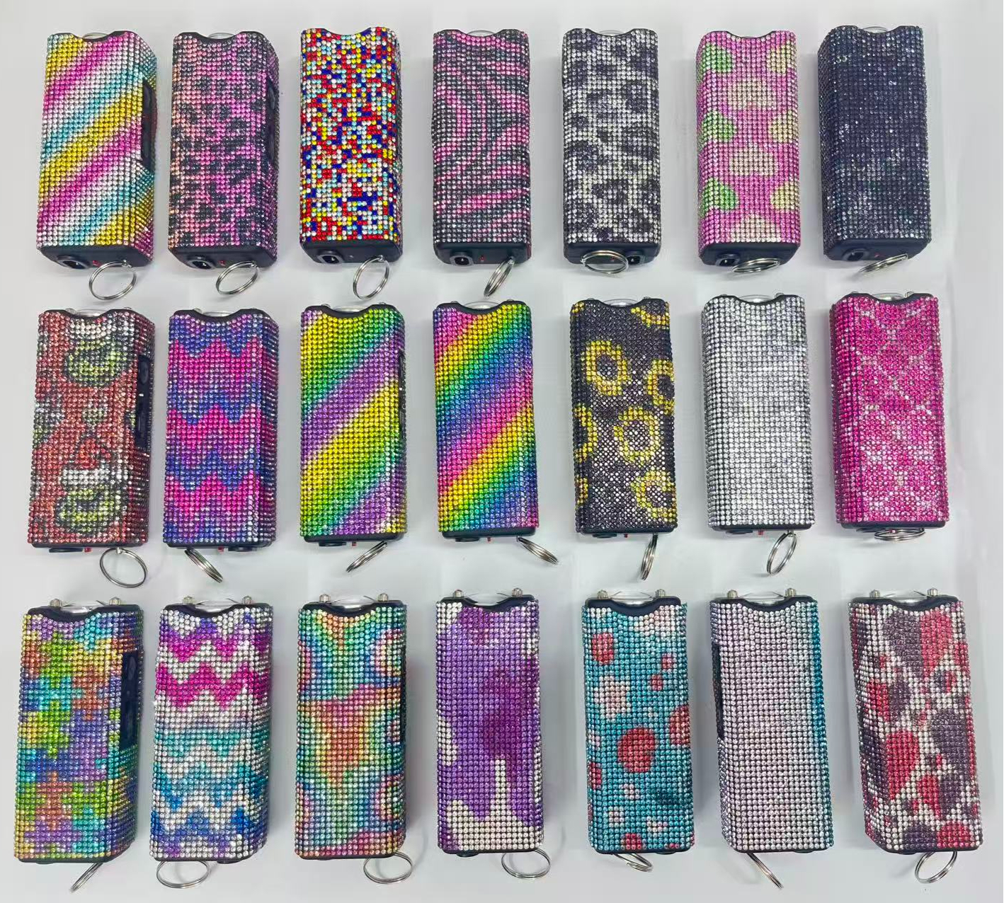 Self-defense multi-functional flashlight + spray keychain set for women.