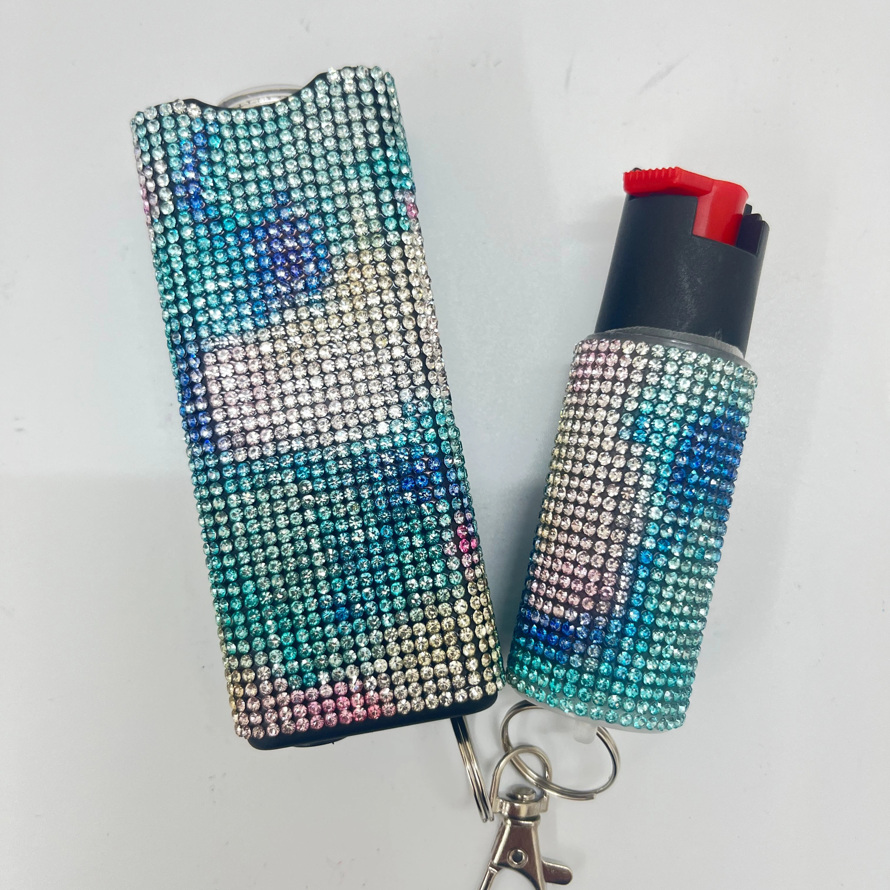 Self-defense multi-functional flashlight + spray keychain set for women.