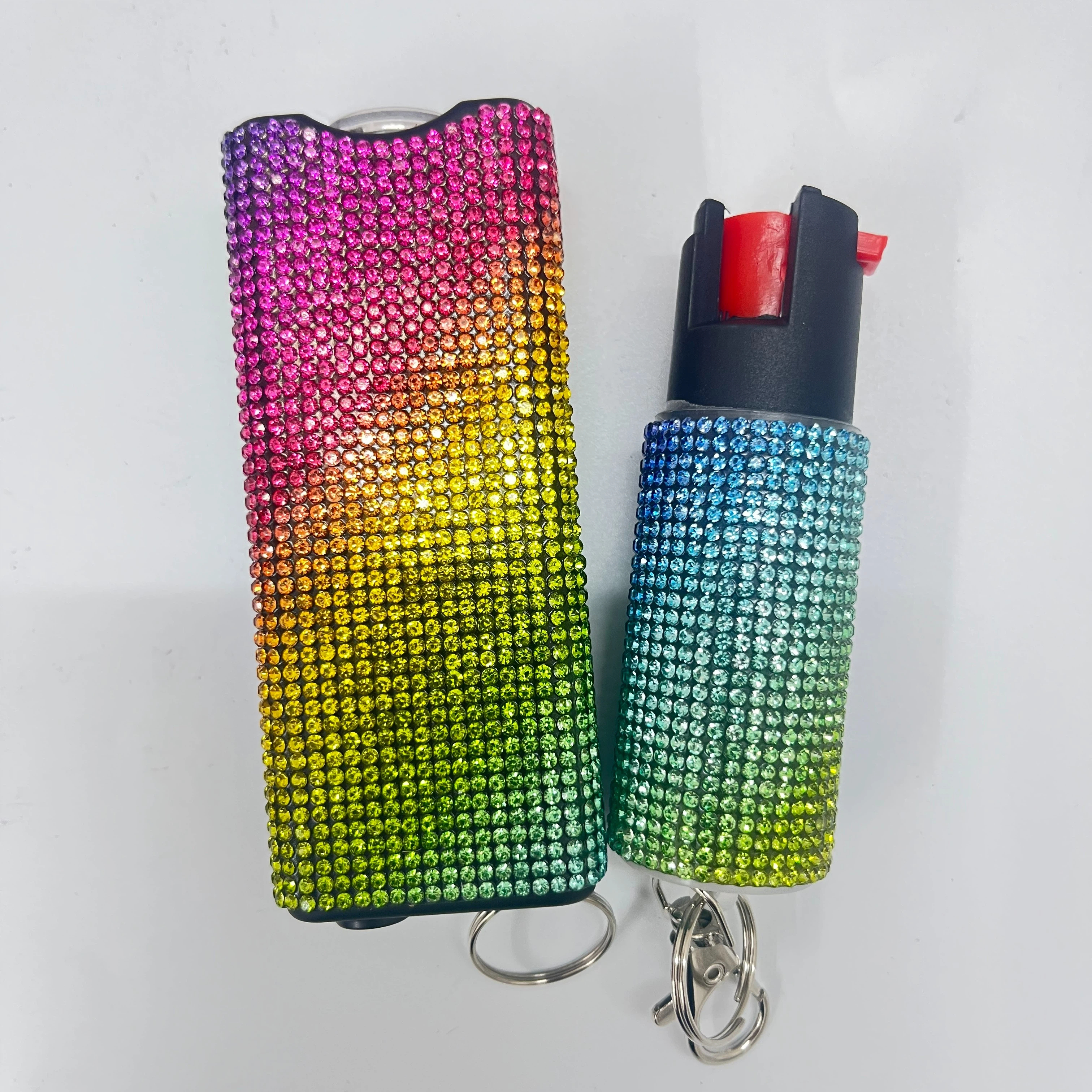 Self-defense multi-functional flashlight + spray keychain set for women.