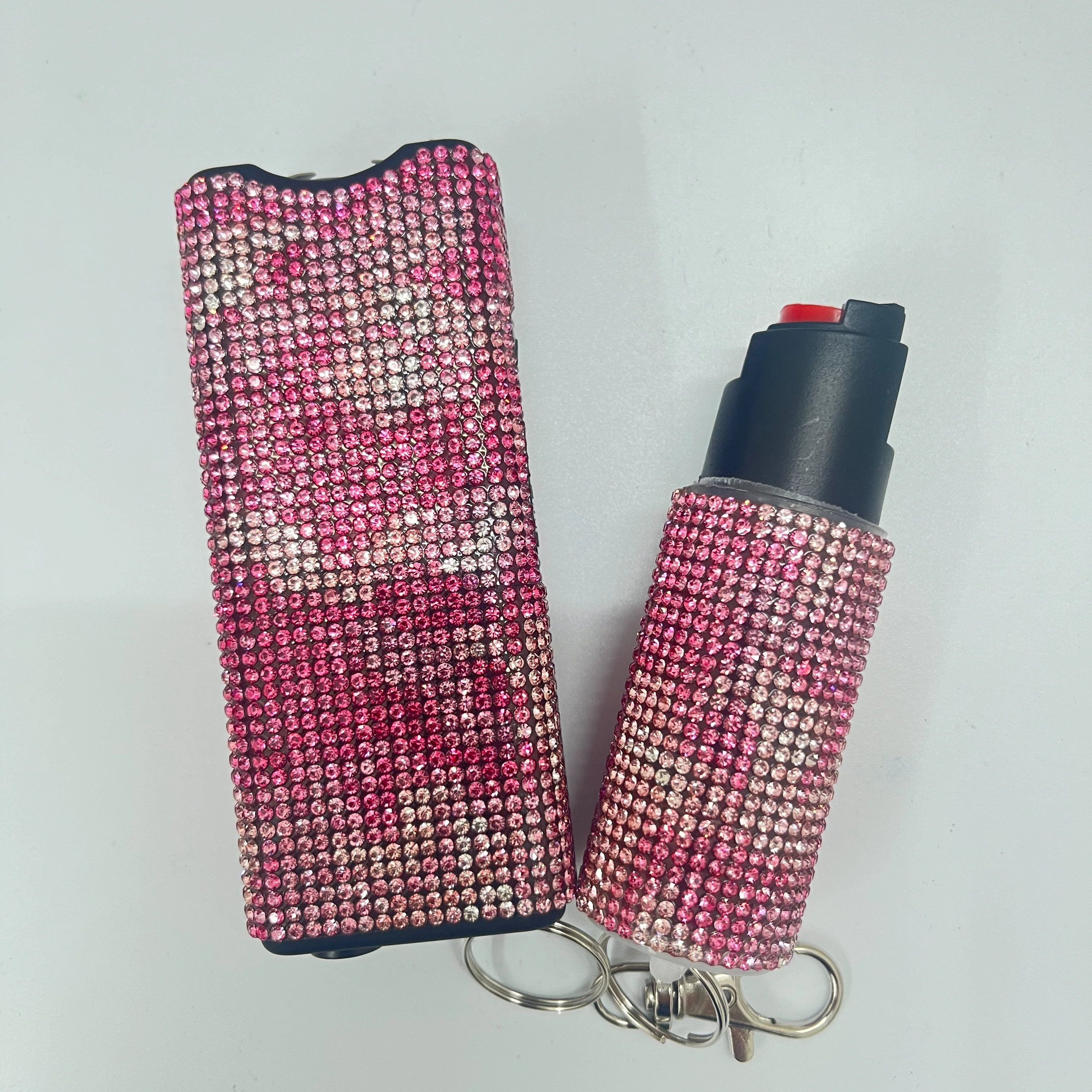 Self-defense multi-functional flashlight + spray keychain set for women.