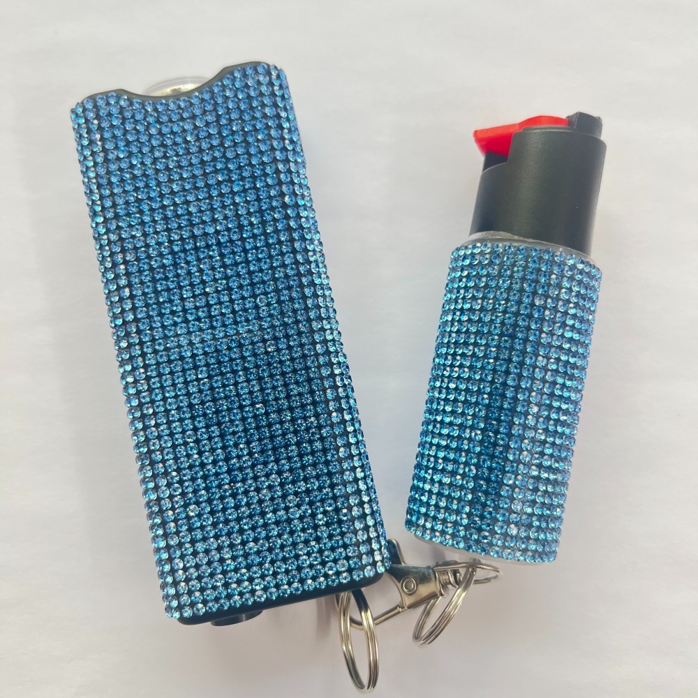 Women's solid-color self-defense flashlight and spray set.