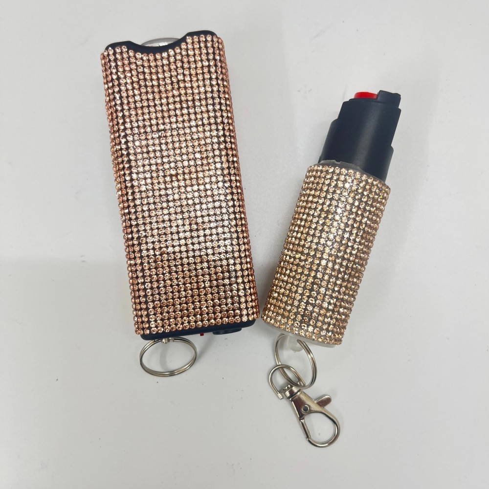 Women's solid-color self-defense flashlight and spray set.
