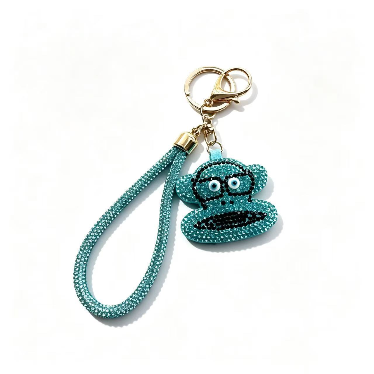 Rhinestone-encrusted cartoon monkey keychain