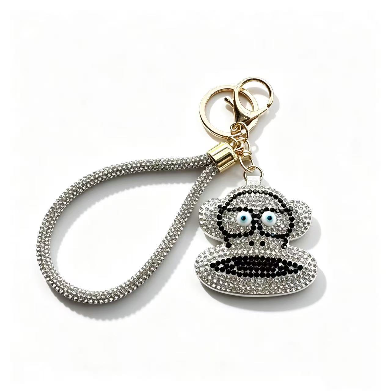 Rhinestone-encrusted cartoon monkey keychain