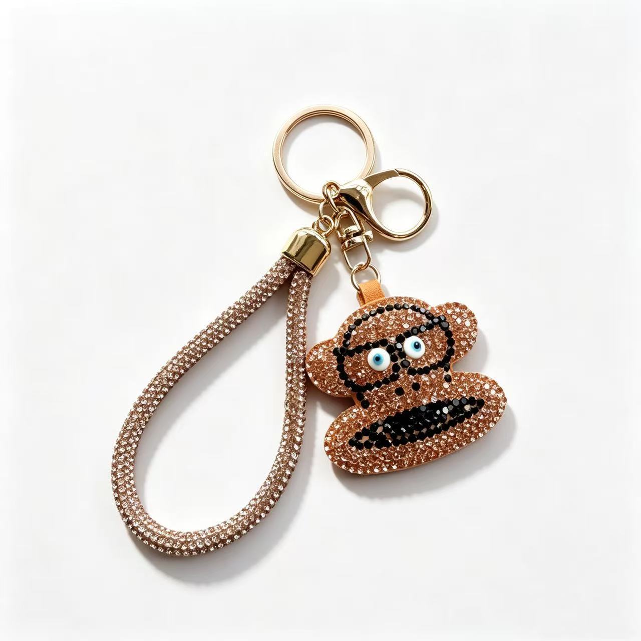 Rhinestone-encrusted cartoon monkey keychain