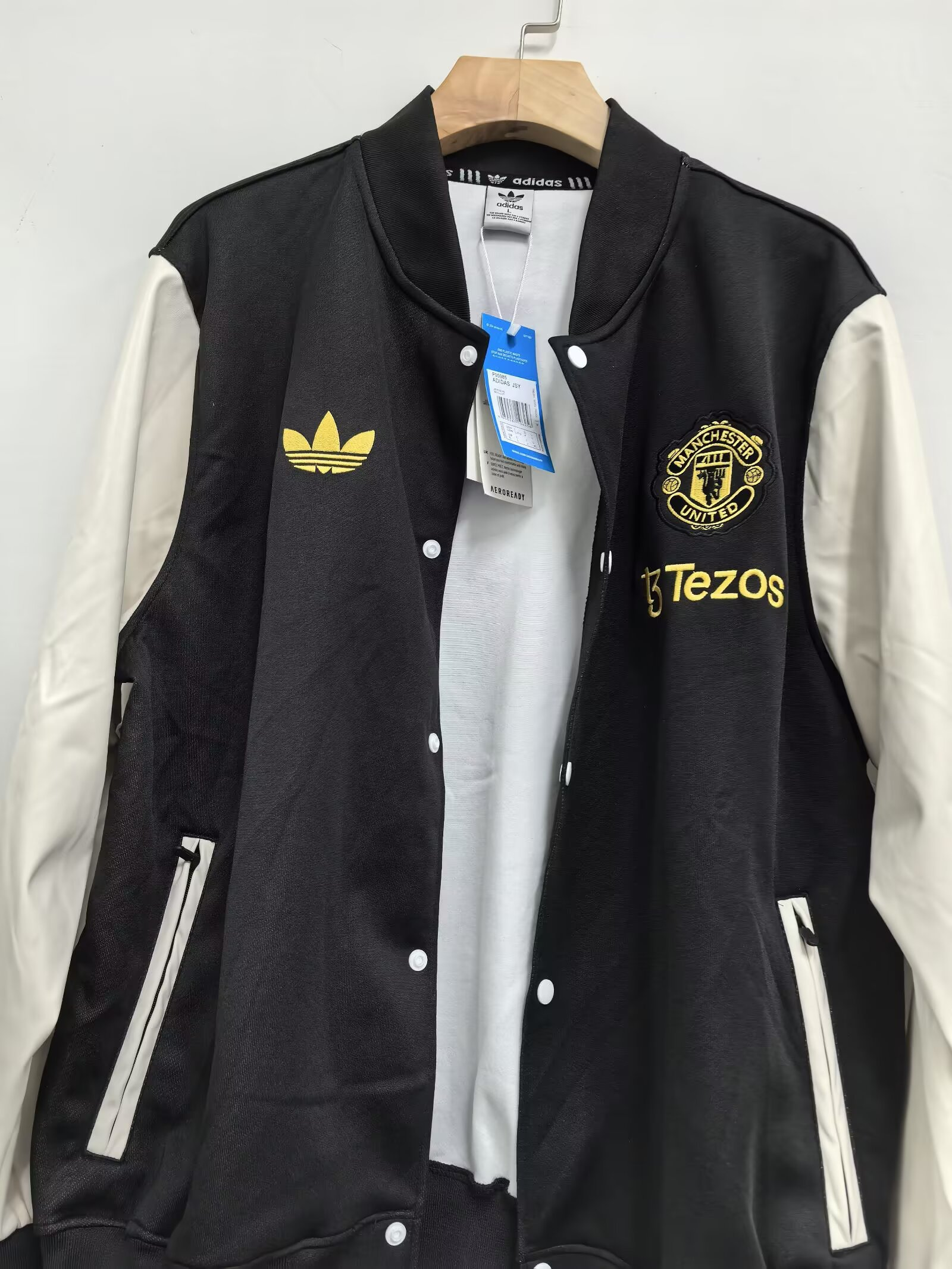 Manchester United retro leather jacket with button closure