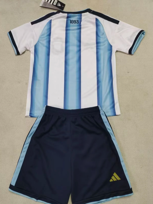 26 & 27 Argentine children's home and away clothing