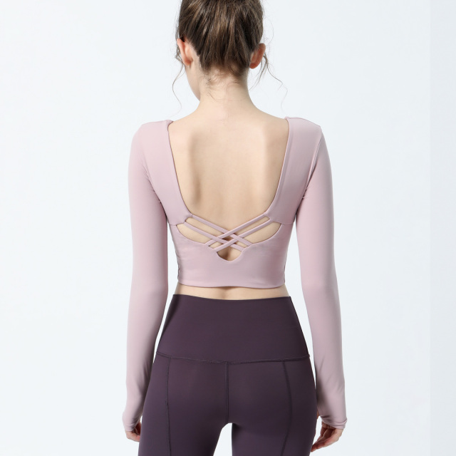 Women gym and fitness top with straps and pads