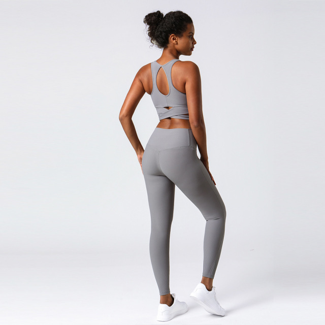 Women yoga pants and bra tops one set running gym fitness wear tops and leggings rib materials.
