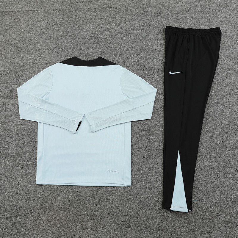 Barcelona 24/25 Adults  Long sleeves half-zip training suit Top + pants