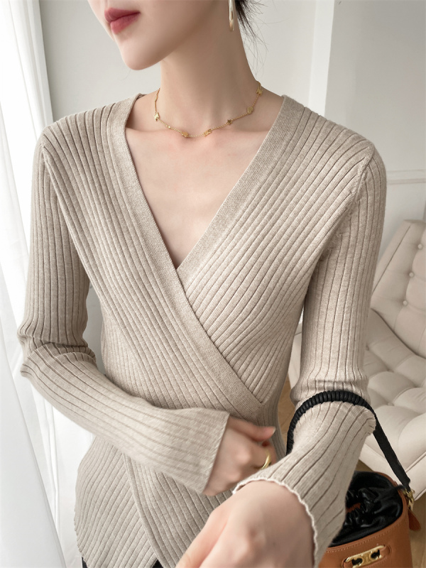 Oat colored V-neck cross sweater