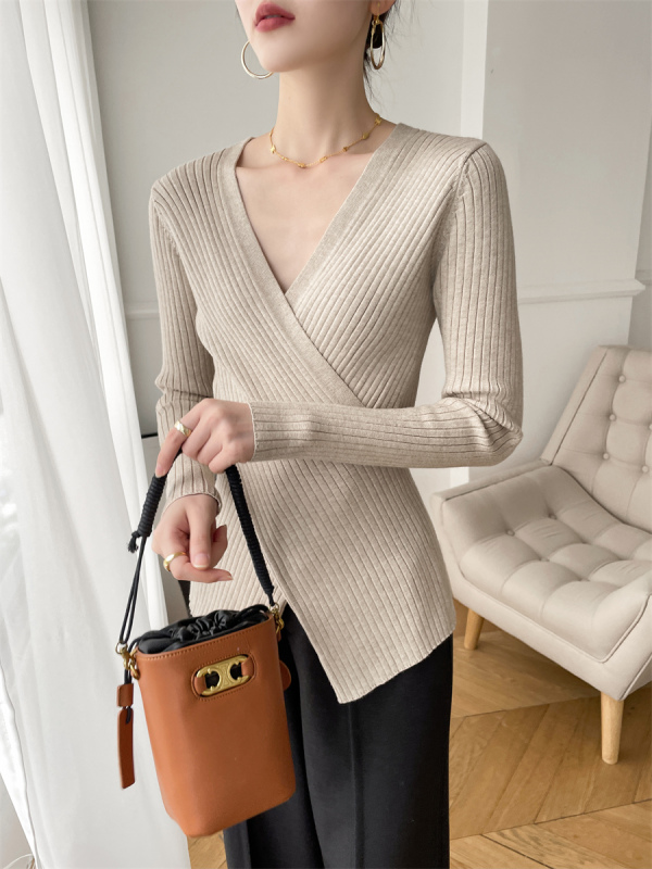 Oat colored V-neck cross sweater