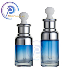 Cosmetic essential oil bottle 20ml 30ml 50ml blue round skin care packaging serum glass dropper bottle