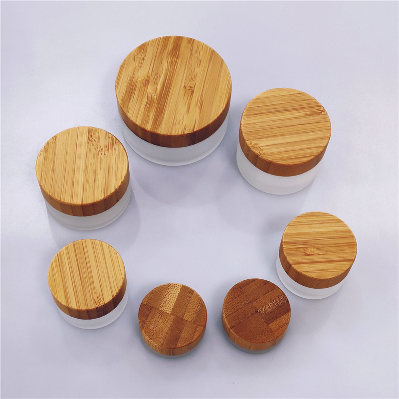 Cosmetic glass cream jar with bamboo lid CBD oil custom color