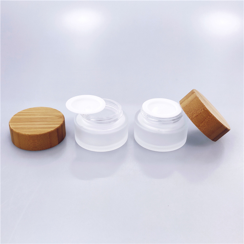 Cosmetic glass cream jar with bamboo lid CBD oil custom color