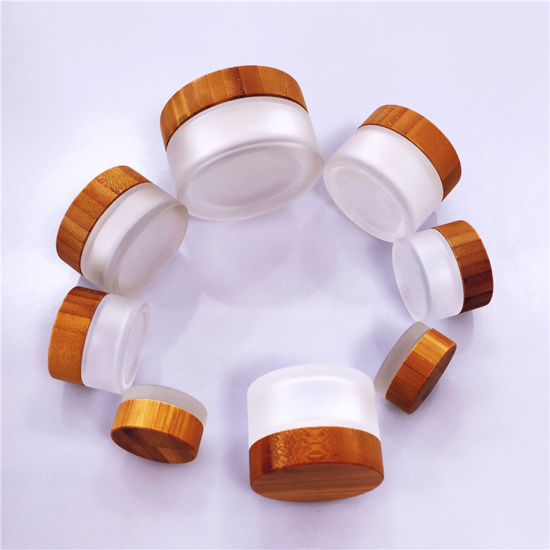 Cosmetic glass cream jar with bamboo lid CBD oil custom color