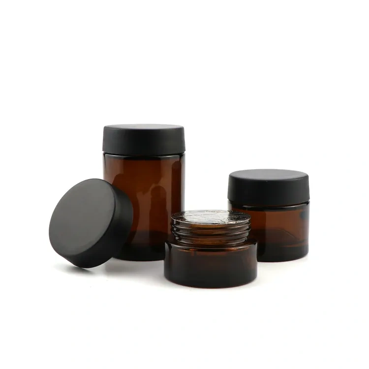Custom logo 2oz 4oz round black uv child safe proof edibles WAX OIL glass jars with black childproof cap