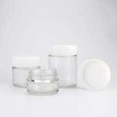 Custom Child Resistant Glass Jar 1oz 2oz 3oz 4oz Clear Smell Proof Glass Jars With White Childproof Cap