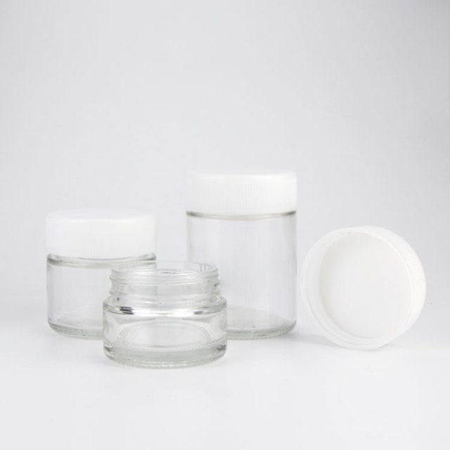 Custom Child Resistant Glass Jar 1oz 2oz 3oz 4oz Clear Smell Proof Glass Jars With White Childproof Cap