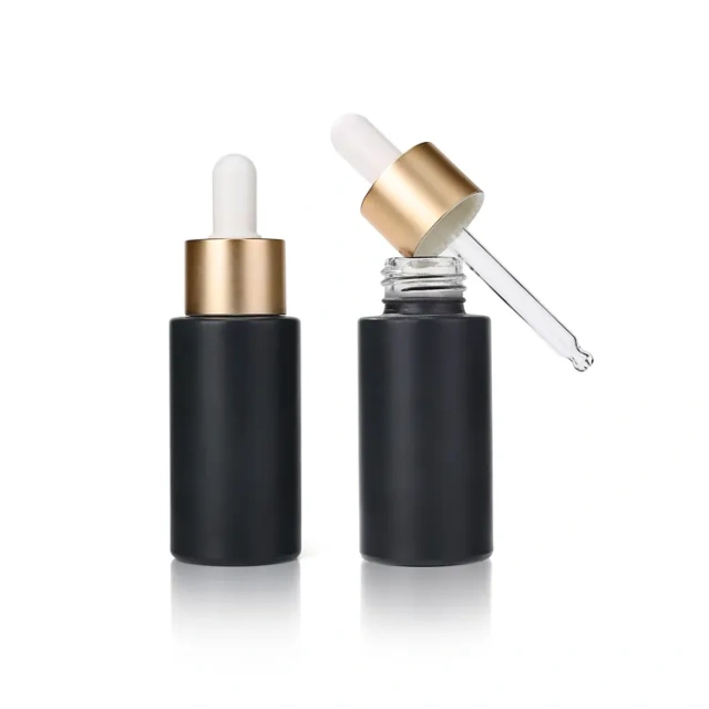 Luxury flat shoulder cosmetic dropper bottle custom 24mm screw neck triqube jar liquid essential oil glass dropper bottle