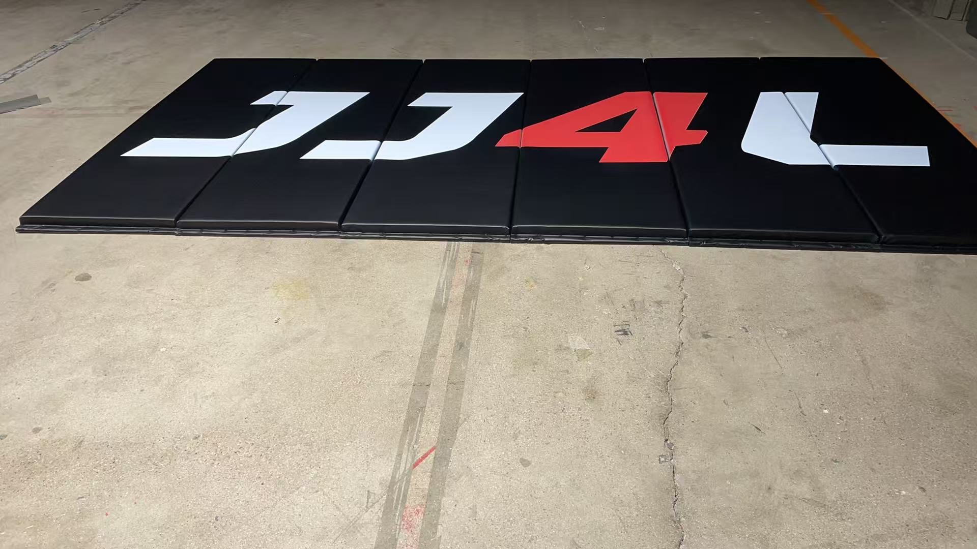 Production quality inspection of custom roll-out BJJ mat for dojo flooring upgrade