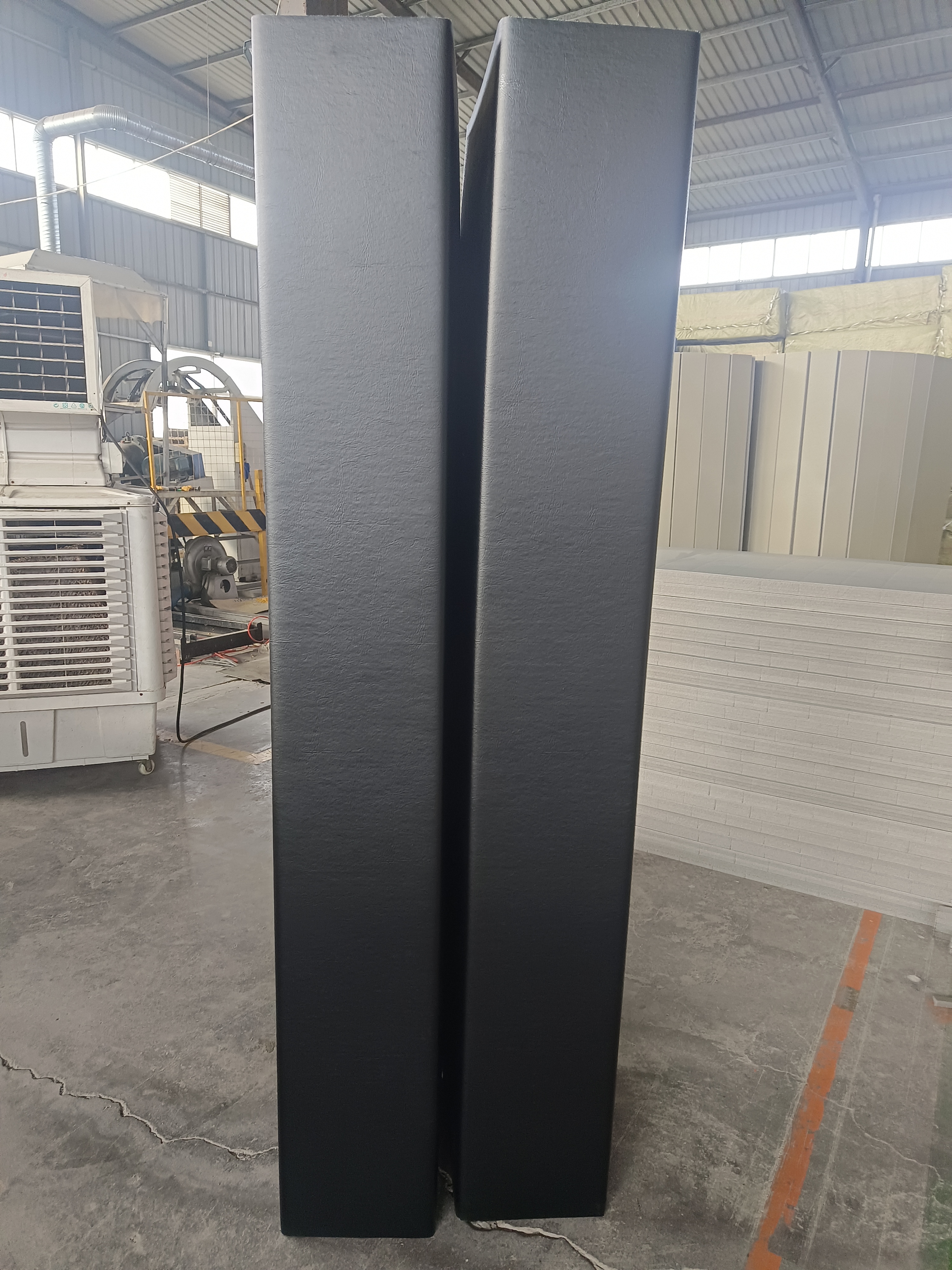 Column wrapped with QT MAT roll-out mat material