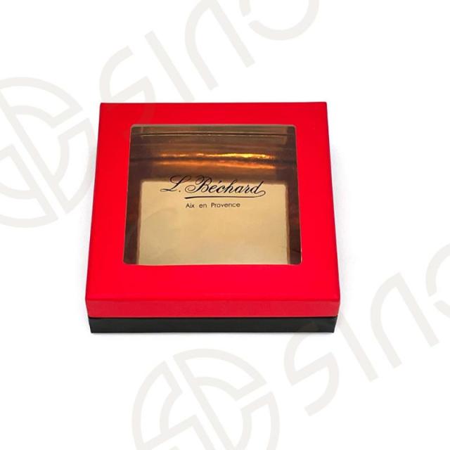 Rigid box with window lid